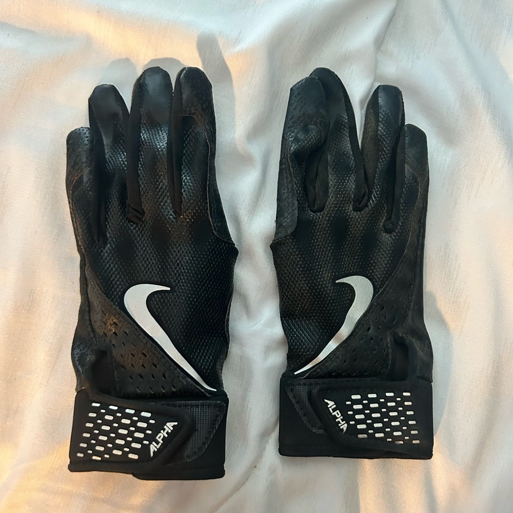 Black Nike batting gloves